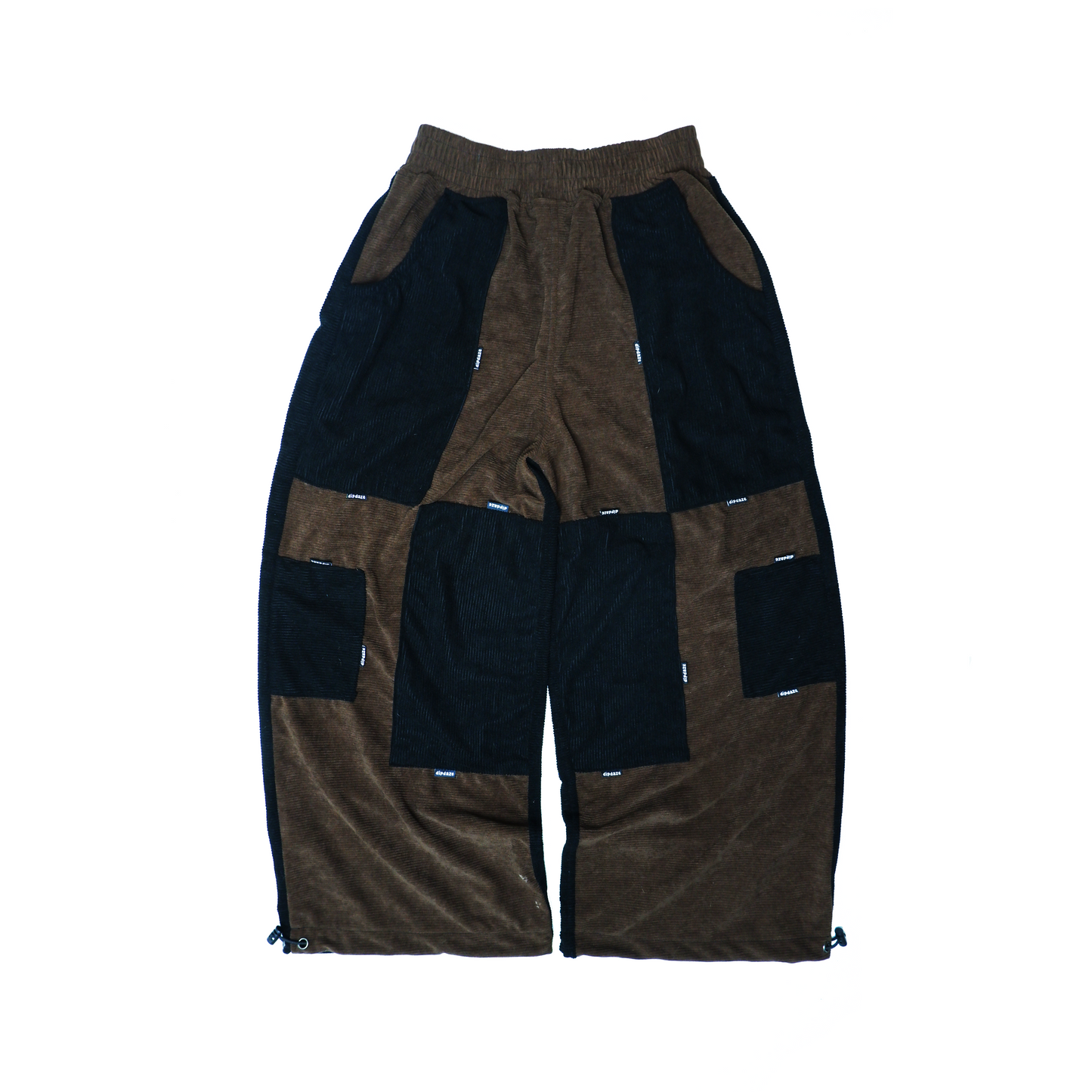 "PATCHWORK UTILITY PANTS, (2/2)."