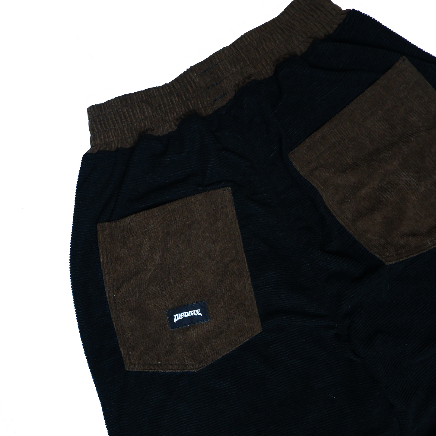 "PATCHWORK UTILITY PANTS, (2/2)."